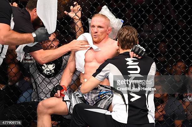 Dennis Siver of Germany rests in his corner between rounds against Tatsuya Kawajiri of Japan in their featherweight bout during the UFC Fight Night...