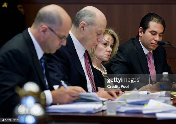 New Jersey Gov. Chris Christie's former Deputy Chief of Staff Bridget Anne Kelly sits with attorneys Kevin H. Marino Michael Critchley and attorneys...