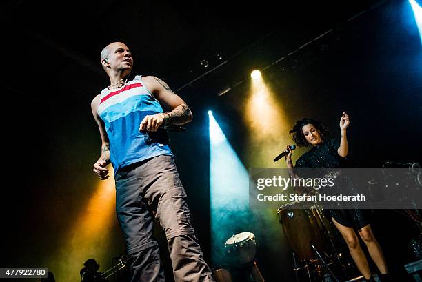 Singers Residente aka Rene Perez Joglar and PG-13 aka Ileana Cabra Joglar of Calle 13 perform live on stage during a concert at Columbiahalle on June...