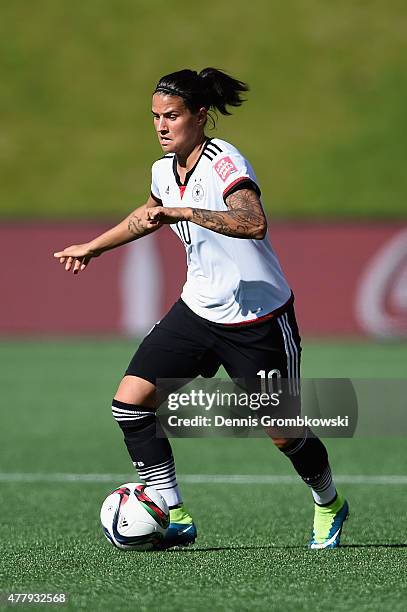 Dzsenifer Marozsan of Germany controls the ball during the FIFA Women's World Cup Canada 2015 Round of 16 match between Germany and Sweden at...