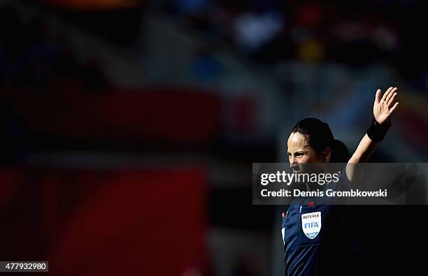 Referee Ri Hyang Ok gestures during the FIFA Women's World Cup Canada 2015 Round of 16 match between Germany and Sweden at Lansdowne Stadium on June...