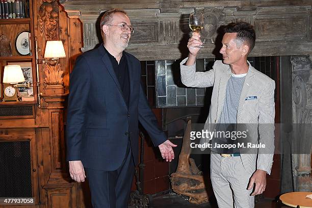 Jim Nelson and Jim Moore attend GQ Party for Jim Moore during Milan Menswear Fashion Week Spring/Summer 2016 at Casa Degli Atellani on June 20, 2015...
