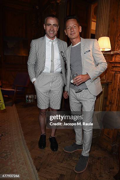 Thom Browne and Jim Nelson attend GQ Party for Jim Moore during Milan Menswear Fashion Week Spring/Summer 2016 at Casa Degli Atellani on June 20,...