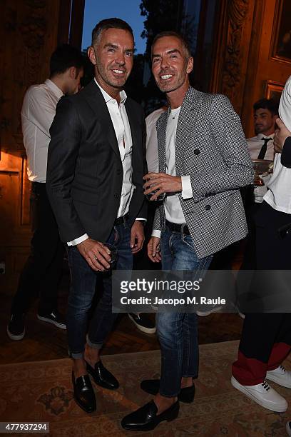 Dean Caten and Dan Caten attend GQ Party for Jim Moore during Milan Menswear Fashion Week Spring/Summer 2016 at Casa Degli Atellani on June 20, 2015...