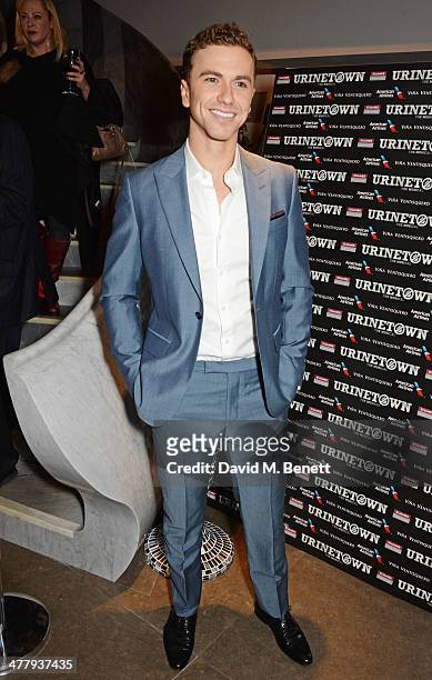 Cast member Richard Fleeshman attends the press night performance of "Urinetown" at the St James Theatre on March 11, 2014 in London, England.