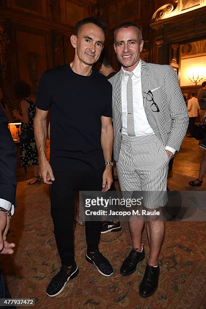 Thom Browne and Neil Barrett attend GQ Party for Jim Moore during Milan Menswear Fashion Week Spring/Summer 2016 at Casa Degli Atellani on June 20,...