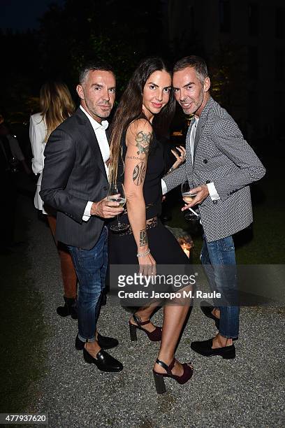 Dean Caten, Dan Caten and Benedetta Mazzini attend GQ Party for Jim Moore during Milan Menswear Fashion Week Spring/Summer 2016 at Casa Degli...