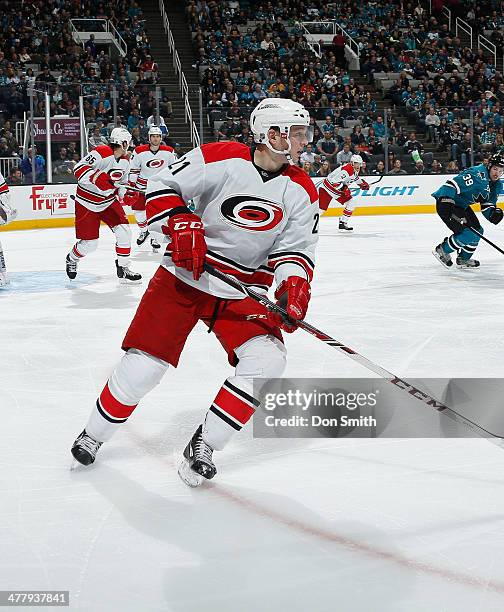 Drayson Bowman of the Carolina Hurricanes skates after the puck against the San Jose Sharks during an NHL game on March 4, 2014 at SAP Center in San...