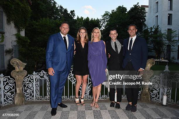 Howard Mittman, Carly Holden and guests attend GQ Party for Jim Moore during Milan Menswear Fashion Week Spring/Summer 2016 at Casa Degli Atellani on...