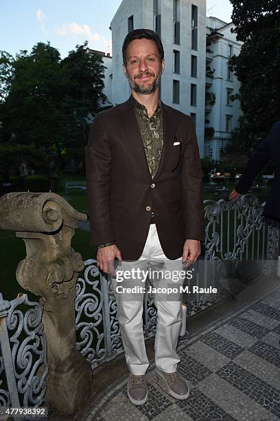 Guest attends GQ Party for Jim Moore during Milan Menswear Fashion Week Spring/Summer 2016 at Casa Degli Atellani on June 20, 2015 in Milan, Italy.
