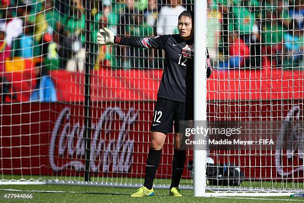Wang Fei of China PR directs her teammates during the FIFA Women's World Cup 2015 Round of 16 match between China PR and Cameroon at Commonwealth...