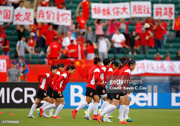 China PR warms up prior to the FIFA Women's World Canada 2015 Round of 16 match between China PR and Cameroon at Commonwealth Stadium on June 20,...