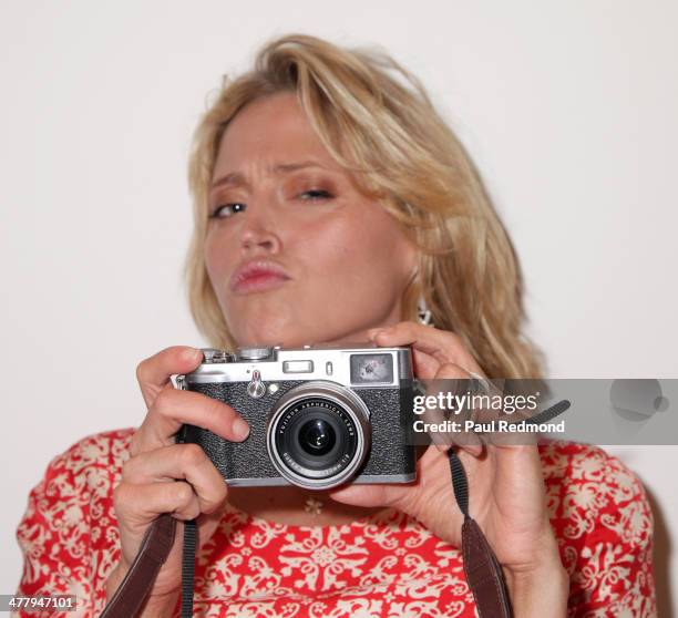 Actress Estella Warren attends Alexander Yulish "An Unquiet Mind" VIP Opening Reception at KM Fine Arts LA Studio on March 8, 2014 in Los Angeles,...