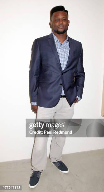 Player Walter Thurmond attends Alexander Yulish "An Unquiet Mind" VIP Opening Reception at KM Fine Arts LA Studio on March 8, 2014 in Los Angeles,...