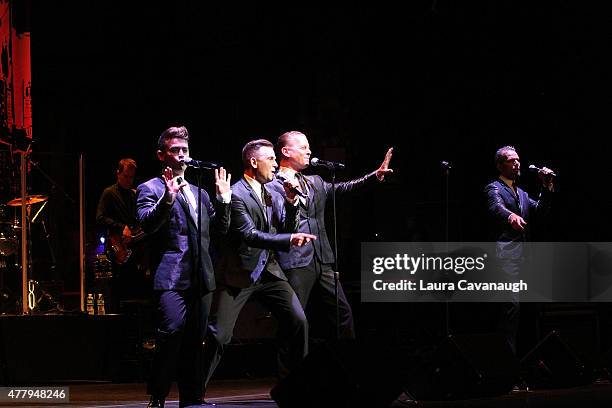 Michael Longoria, Daniel Reichard, Christian Hoff and J. Robert Spencer of The Midtown Men perform at The Midtown Men Homecoming Concert at the...