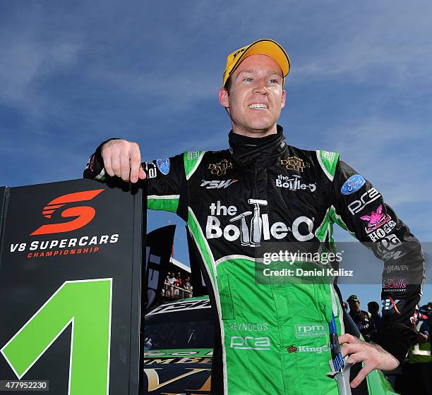 Race winner David Reynolds driver of the The Bottle-O Racing Team Ford FG X Falcon celebrates after race 15 for the V8 Supercars Triple Crown Darwin...