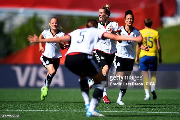 Anja Mittag of Germany celebrates after scoring her teams first goal during the FIFA Women's World Cup 2015 Round of 16 match between Germany and...