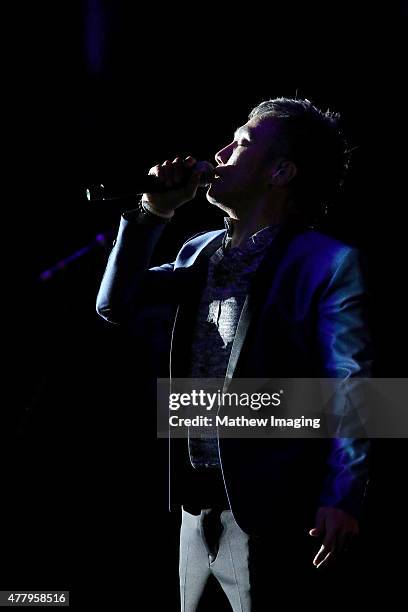 Singer Arnel Pineda of Journey performs onstage during Hollywood Bowl Opening Night 2015 at the Hollywood Bowl on June 20, 2015 in Hollywood,...