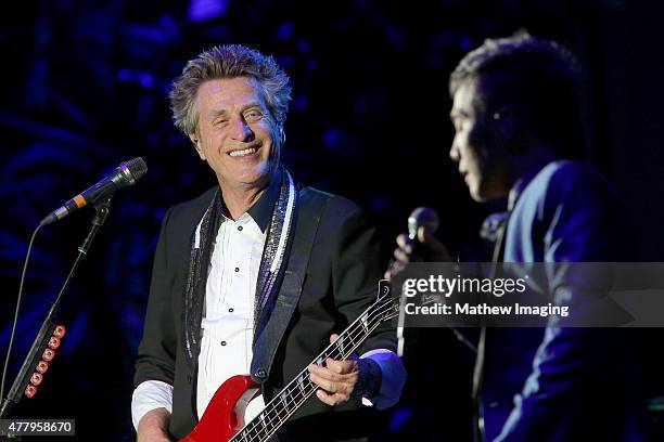 Musician Ross Valory and singer Arnel Pineda of Journey perform onstage during Hollywood Bowl Opening Night 2015 at the Hollywood Bowl on June 20,...