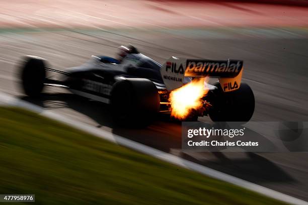 Former driver Nelson Piquet drives on the track after qualifying for the Formula One Grand Prix of Austria at Red Bull Ring on June 20, 2015 in...