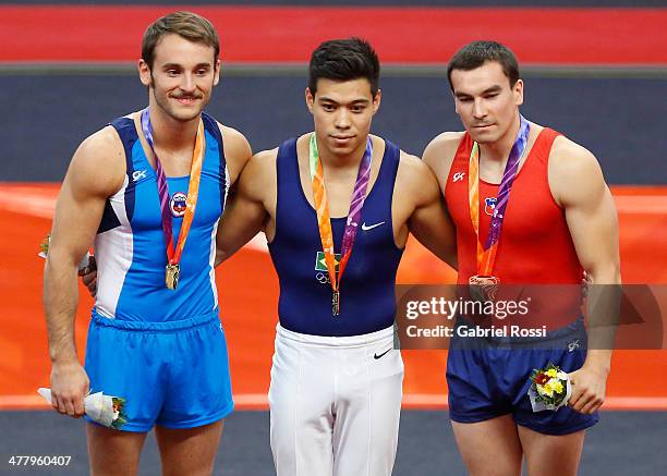 Gold medalist Tomas Gonzalez of Chile, gold medalist Sergio Sasaky of Brazil and Bronze medalist Juan Pablo Gonzalez of Chile in the podium of Men's...