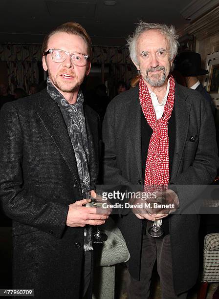 Simon Pegg and Jonathan Pryce attend a private screening of "The Zero Theorem" at the Charlotte Street Hotel on March 11, 2014 in London, England.