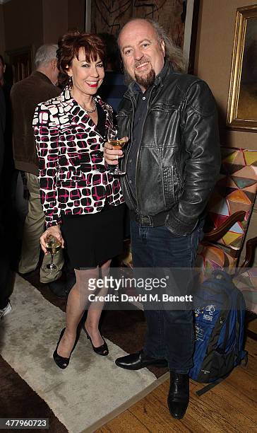 Kathy Lette and Bill Bailey attend a private screening of "The Zero Theorem" at the Charlotte Street Hotel on March 11, 2014 in London, England.