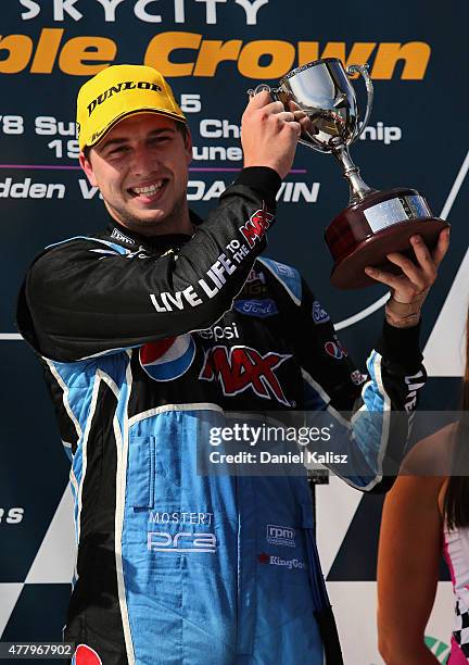 Chaz Mostert driver of the Pepsi Max Crew PRA Ford FG X Falcon reacts on the podium during race 15 for the V8 Supercars Triple Crown Darwin at Hidden...