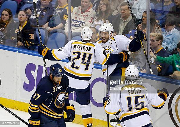 Eric Nystrom and Shea Weber of the Nashville Predators celebrate Weber's goal in the second period against the Buffalo Sabres at First Niagara Center...