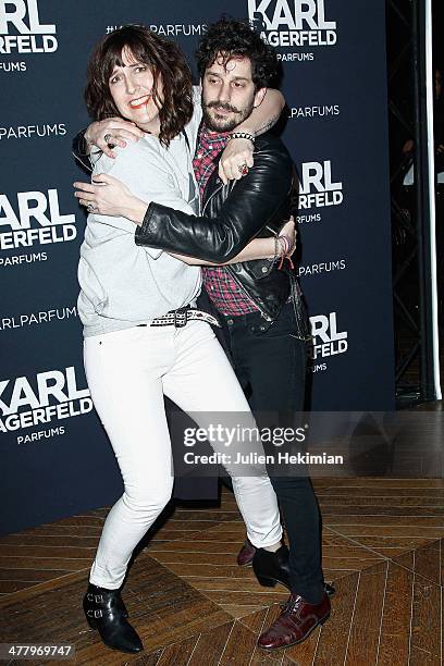 Daphne Burki and Gunther Love attend the Karl Lagerfeld New Perfume launch party at Palais Brongniart on March 11, 2014 in Paris, France.