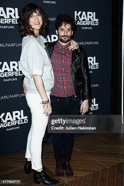 Daphne Burki and Gunther Love attend the Karl Lagerfeld New Perfume launch party at Palais Brongniart on March 11, 2014 in Paris, France.