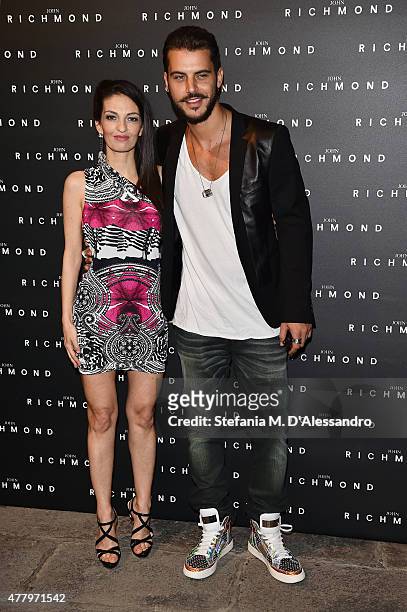 Alessandra Moschillo and Andrea Montovoli attend the John Richmond show during the Milan Men's Fashion Week Spring/Summer 2016 on June 21, 2015 in...