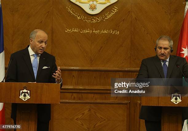 French Foreign Minister Laurent Fabius holds a press conference with his Jordanian counterpart Nasser Judeh at Foreign Ministry in Amman, Jordan on...