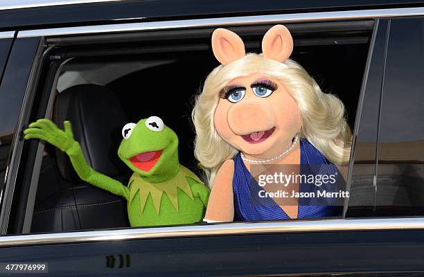 Kermit the Frog and Miss Piggy attend the premiere of Disney's "Muppets Most Wanted" at the El Capitan Theatre on March 11, 2014 in Hollywood,...