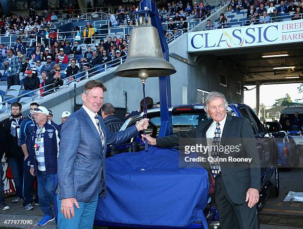 Sam Newman and Ian Nankervis ring the bell before the round 12 AFL match between the Geelong Cats and the Melbourne Demons at Simonds Stadium on June...