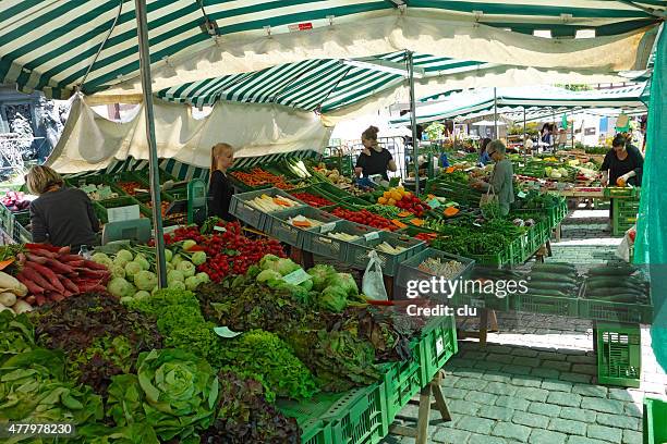 huge vegetable and fruits stand on the market square tübingen - tübingen stock pictures, royalty-free photos & images