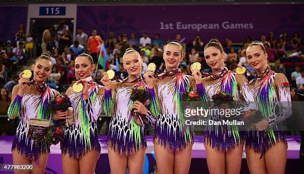 Gold medalists Ksenya Cheldishkina, Maria Kadobina, Valeriya Pischelina, Arina Tsitsilina and Hanna Dudzenkova of Belarus pose with the medals won...