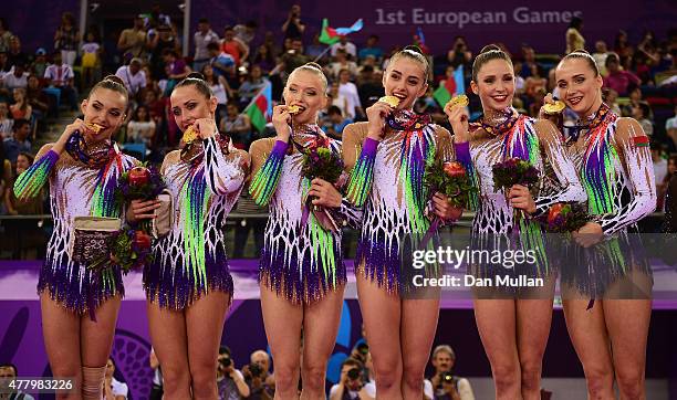 Gold medalists Ksenya Cheldishkina, Maria Kadobina, Valeriya Pischelina, Arina Tsitsilina and Hanna Dudzenkova of Belarus pose with the medals won...