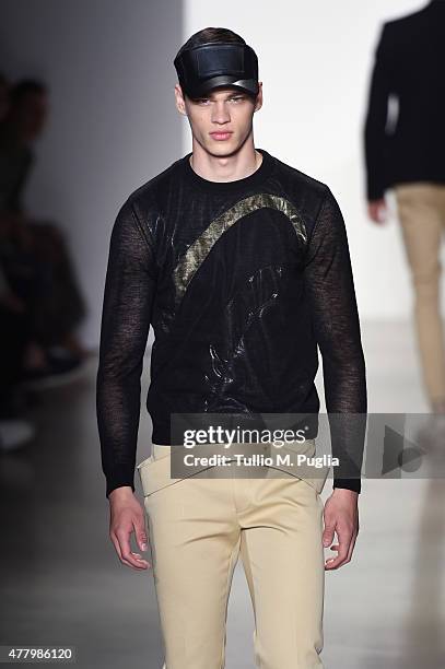 Model walks the runway during the Calvin Klein Collection fashion show as part of Milan Men's Fashion Week Spring/Summer 2016 on June 21, 2015 in...