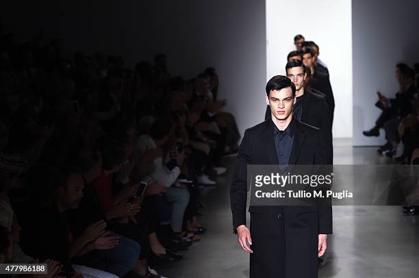 Models walk the runway during the Calvin Klein Collection fashion show as part of Milan Men's Fashion Week Spring/Summer 2016 on June 21, 2015 in...