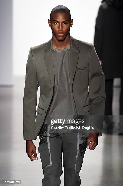 Model walks the runway during the Calvin Klein Collection fashion show as part of Milan Men's Fashion Week Spring/Summer 2016 on June 21, 2015 in...