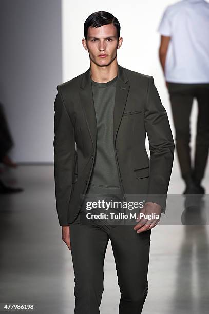 Model walks the runway during the Calvin Klein Collection fashion show as part of Milan Men's Fashion Week Spring/Summer 2016 on June 21, 2015 in...