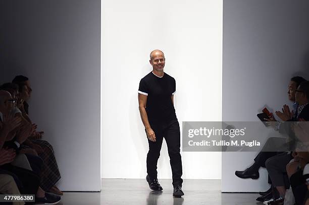 Designer Italo Zucchelli walks the runway after the Calvin Klein Collection show as part of Milan Men's Fashion Week Spring/Summer 2016 on June 21,...