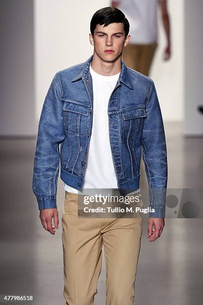 Model walks the runway during the Calvin Klein Collection fashion show as part of Milan Men's Fashion Week Spring/Summer 2016 on June 21, 2015 in...