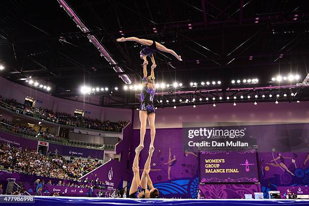 Katsiaryna Barysevich, Veranika Nabokina and Karina Sandovich of Belarus compete during the Acrobatic Gymnastics Women's Group Balance final on day...