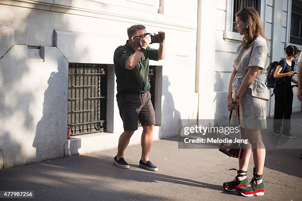 The Sartorialist Scott Schuman photographs a showgoer during Milan Men's Fashion Week Spring/Summer 2016 on June 20, 2015 in Milan, Italy.