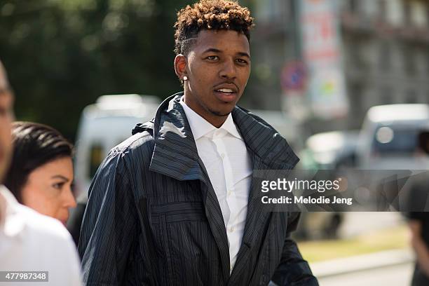 Basketball player Nick Young enters the Ermenegildo Zegna show during Milan Men's Fashion Week Spring/Summer 2016 on June 20, 2015 in Milan, Italy.