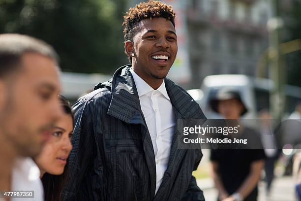 Basketball player Nick Young enters the Ermenegildo Zegna show during Milan Men's Fashion Week Spring/Summer 2016 on June 20, 2015 in Milan, Italy.