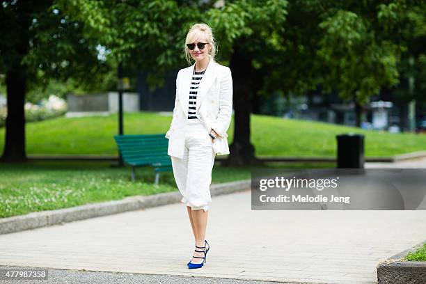 Sarah Ann Murray of The Rake wears a bespoke Rubinacci suit and Nicholas Kirkwood heels during Milan Men's Fashion Week Spring/Summer 2016 on June...