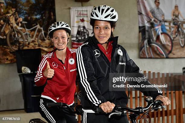 Leonie Maier and Celia Sasic of Germany pose prior to a bike ride on June 21, 2015 in Ottawa, Canada.